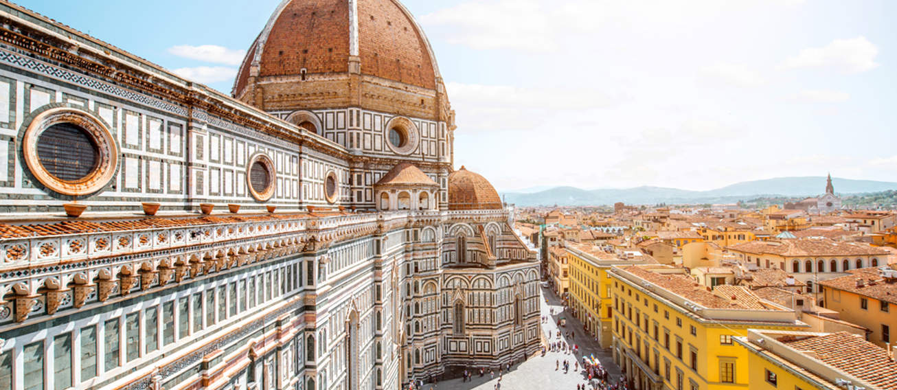 Top Cityscape View On The Dome Of Santa Maria Del Fiore Church And Old Town In Florence