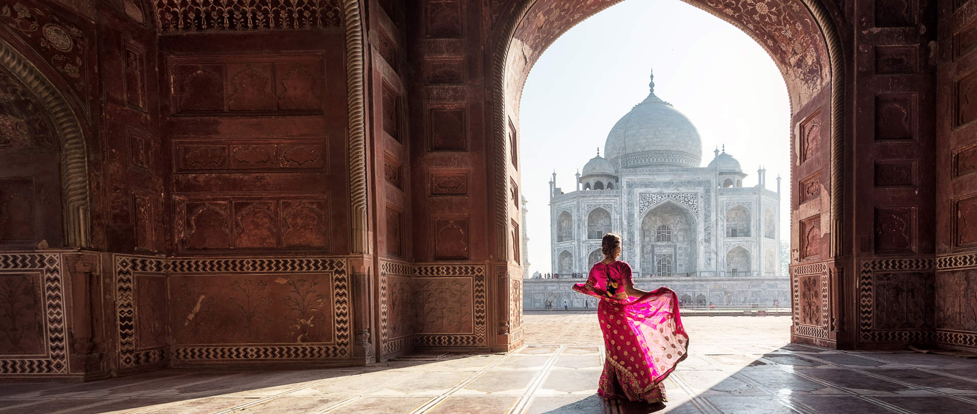 Woman In Red Sareesari In The Taj Mahal, Agra, Uttar Pradesh, India