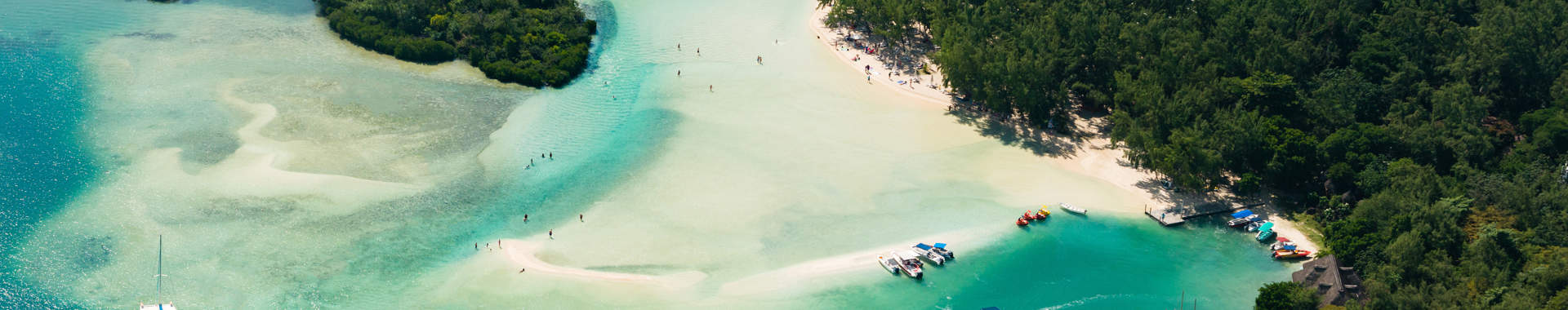Aerial Picture Of Mauritius Island Boat Sailing Around L'ile Aux Cerfs