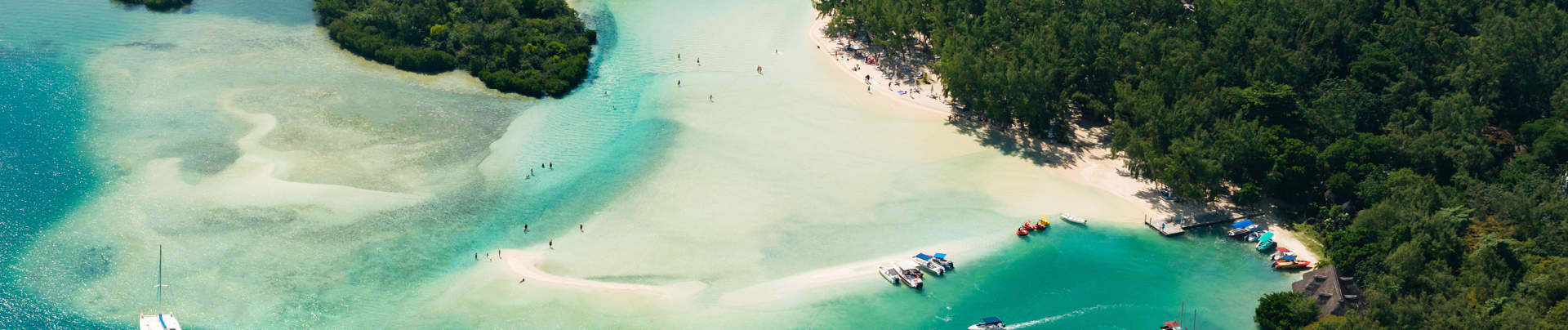 Aerial Picture Of Mauritius Island Boat Sailing Around L'ile Aux Cerfs