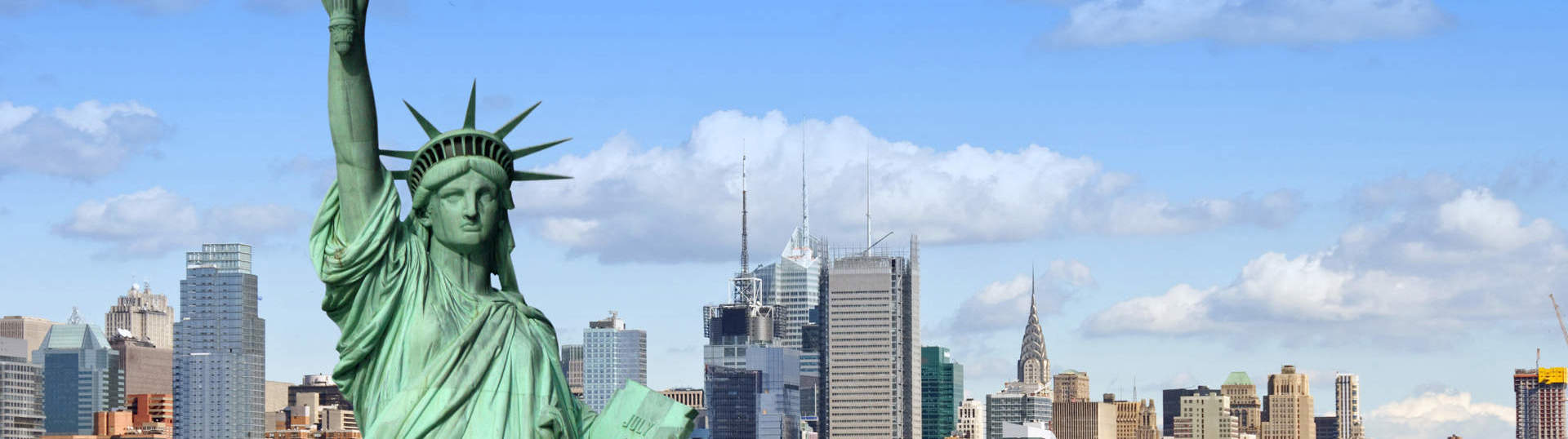 Statue Of Liberty And New York City Skyline