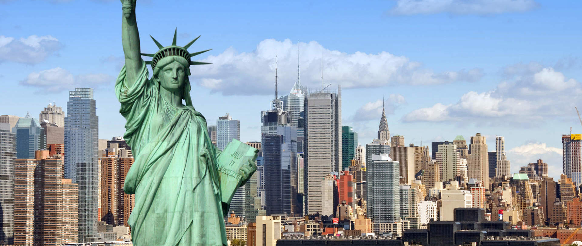 Statue Of Liberty And New York City Skyline