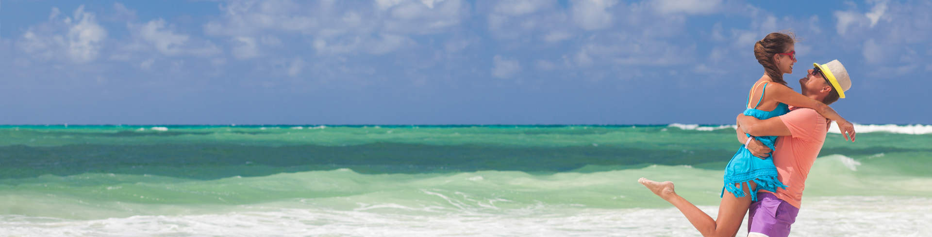Couple On A Beach Embrace