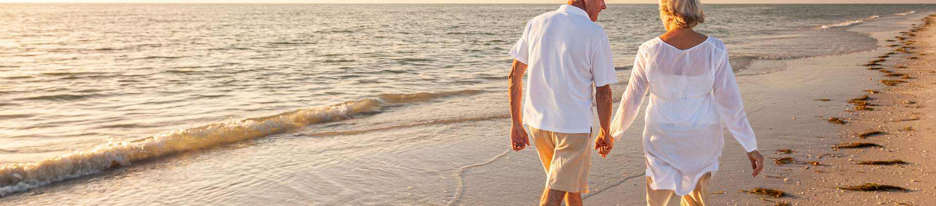 Couple On Beach Holding Hands Generic