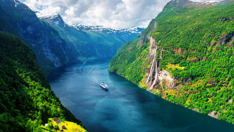 View Of Sunnylvsfjorden Fjord And Famous Seven Sisters Waterfalls Near Geiranger Village In Norway