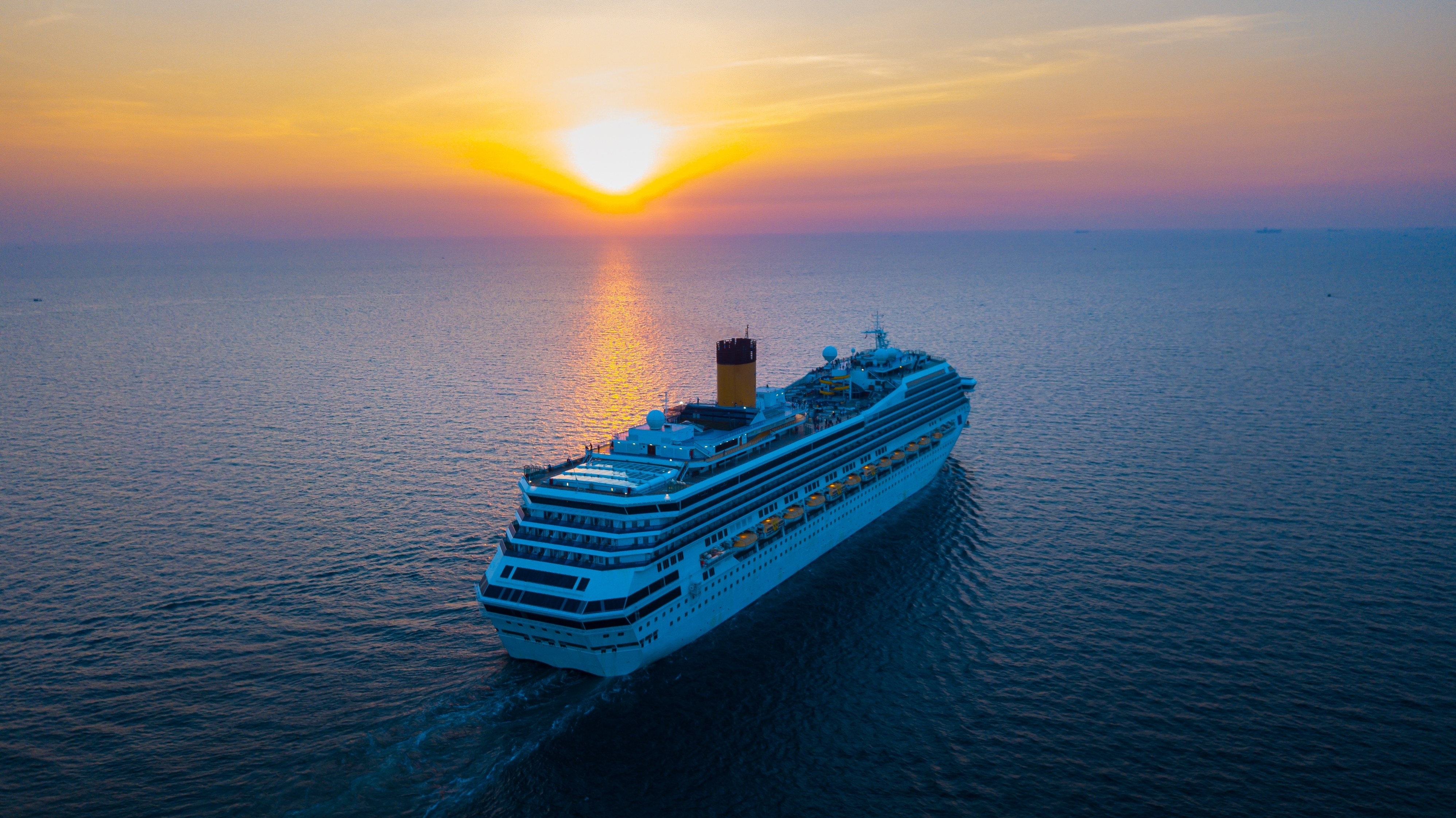 Cruise Ship At Sunset