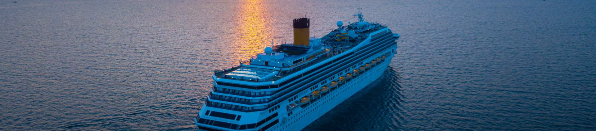 Cruise Ship At Sunset