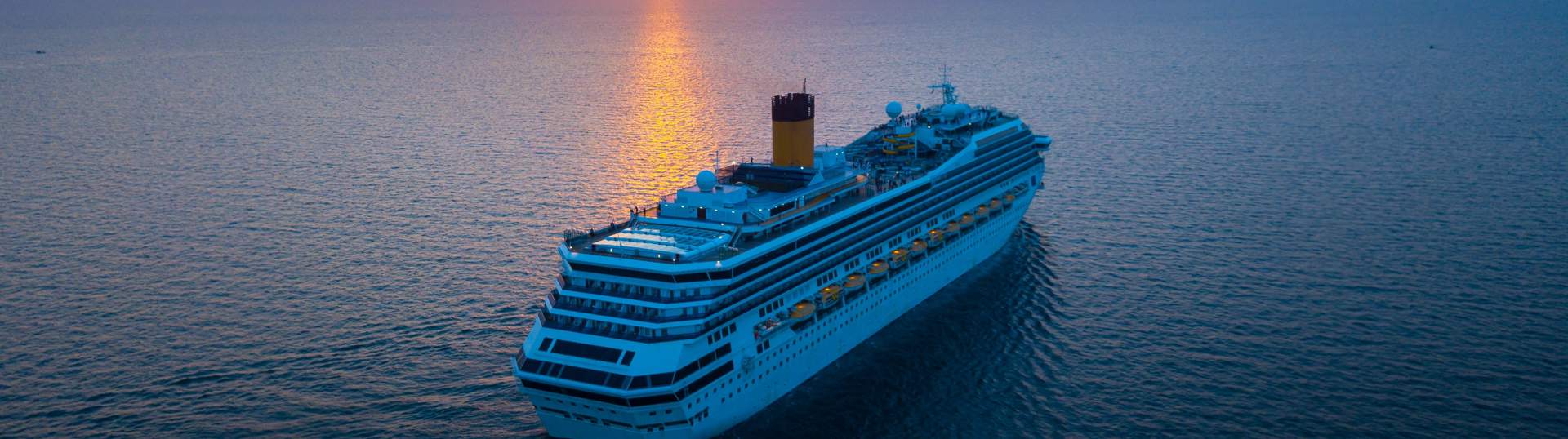 Cruise Ship At Sunset