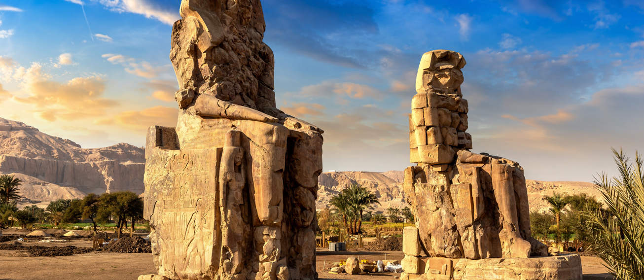 Colossi Of Memnon In Luxor, Valley Of Kings, Egypt In A Sunny Day