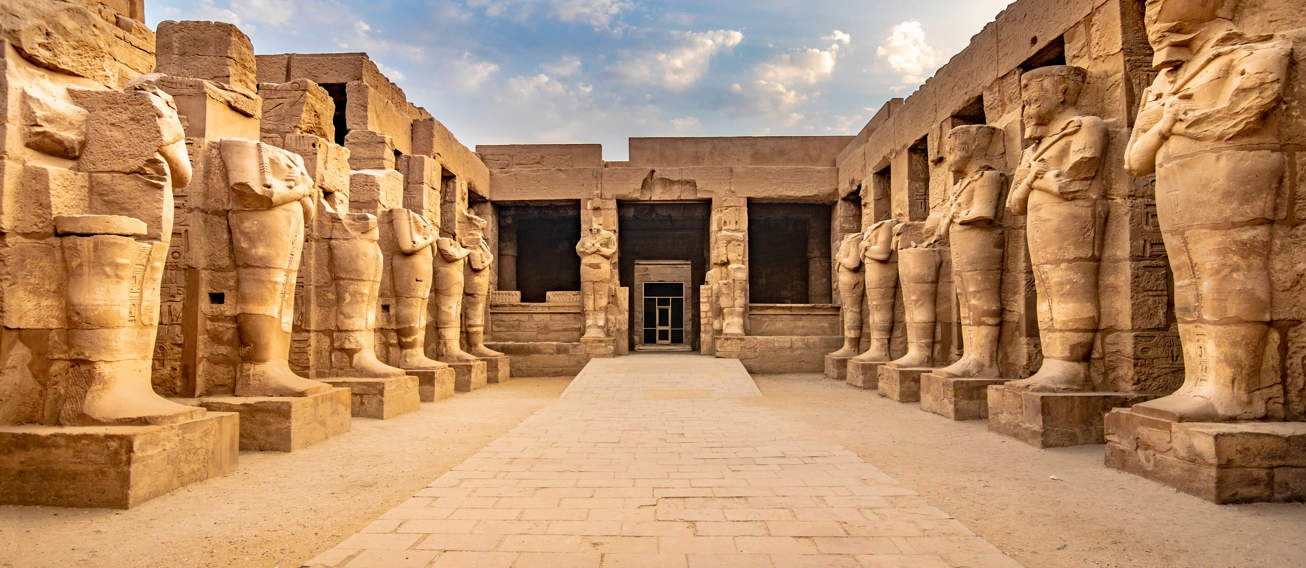 EXPLORING EGYPT KARNAK TEMPLE Large Pharaoh Sculptures Inside Beautiful Egyptian Landmark With Hieroglyphics, Ancient Symbols. Famous World Civilization Art Near Nile River, Cairo