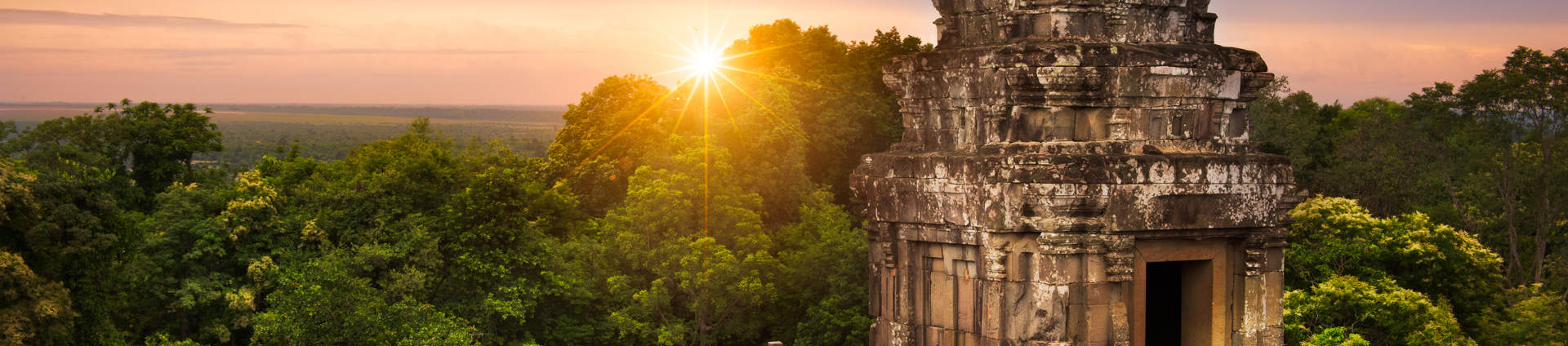 Sun Setting Over The Cambodian Countryside From The Summit Of Phnom Bakheng