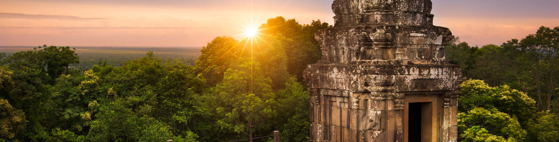 Sun Setting Over The Cambodian Countryside From The Summit Of Phnom Bakheng