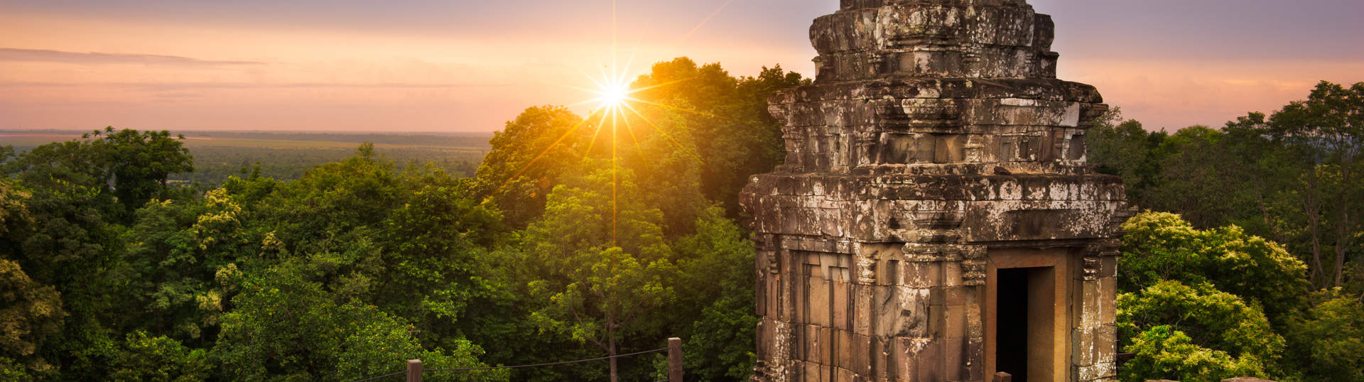 Sun Setting Over The Cambodian Countryside From The Summit Of Phnom Bakheng