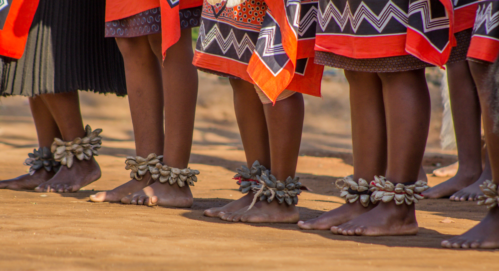 Bare Feet Of Swazi Woman Dancers With Handmade Rattles During Traditional Singing And Dancing