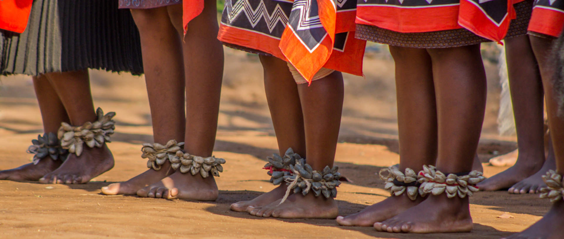 Bare Feet Of Swazi Woman Dancers With Handmade Rattles During Traditional Singing And Dancing